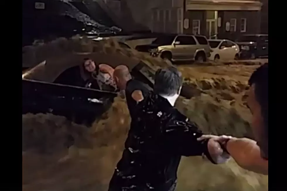 Human Chain Saves Woman in Car From Deadly Flooding